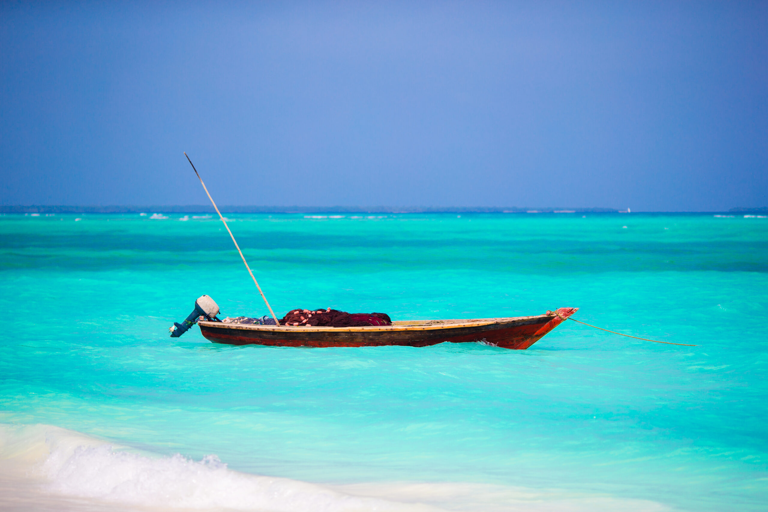 6-Day Great Migration Best of Tanzania Safari old wooden dhow in the indian ocean near zanzibar